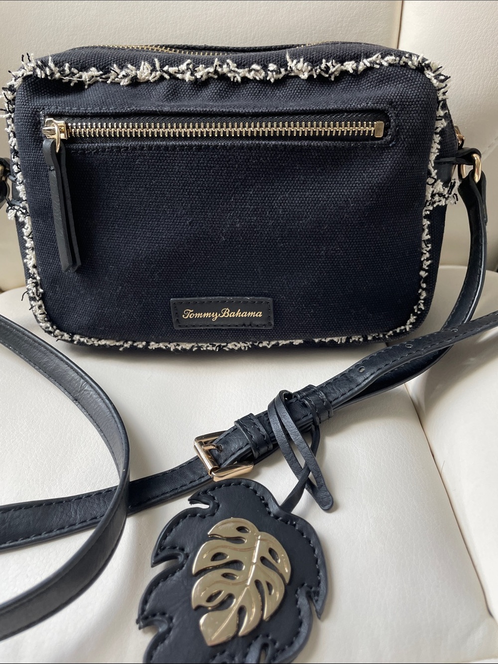 Tommy Bahama Black Crossbody with Fringe Trim and Leaf Charm